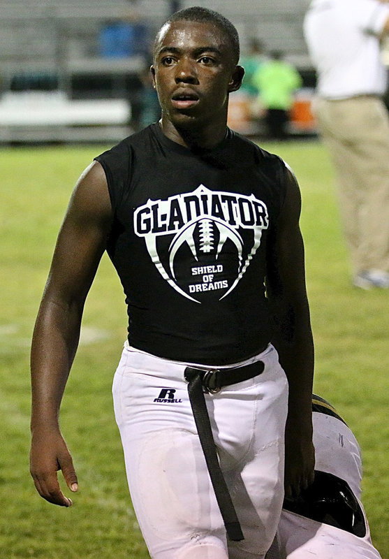Image: Freshman Kendrick Norwood walks off the field with plenty of pride.