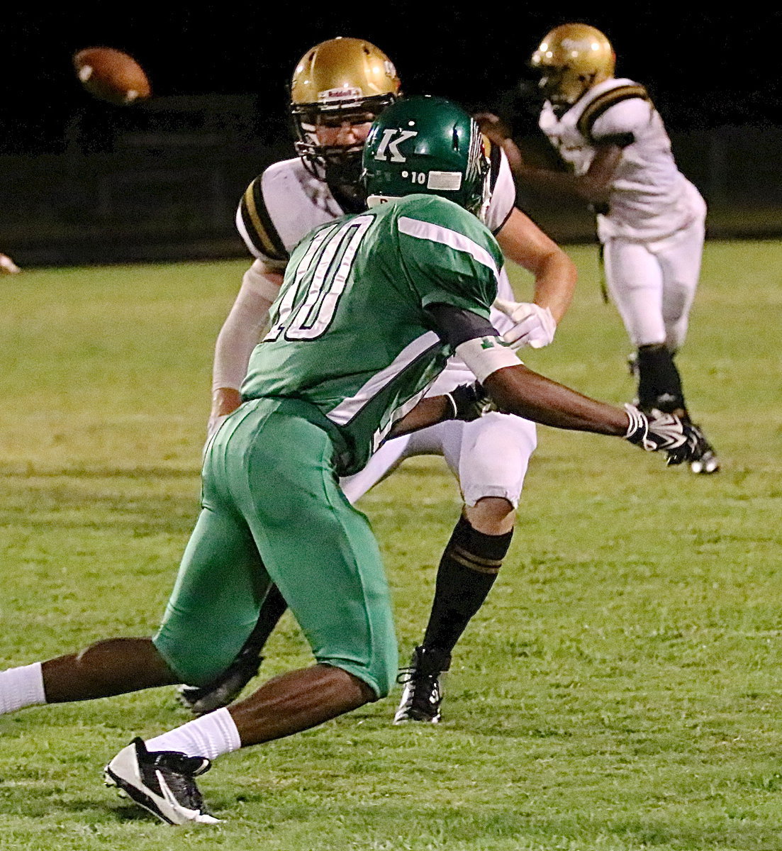 Image: Senior receiver Cody Boyd(15) blocks downfield for teammate Kendrick Norwood(4). Boyd is a Gladiator legacy following the path of his father Randy Boyd.