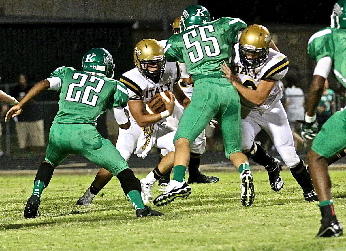 Image: Fullback Coby Jeffords(10) makes space for teammate Joe Celis(8).