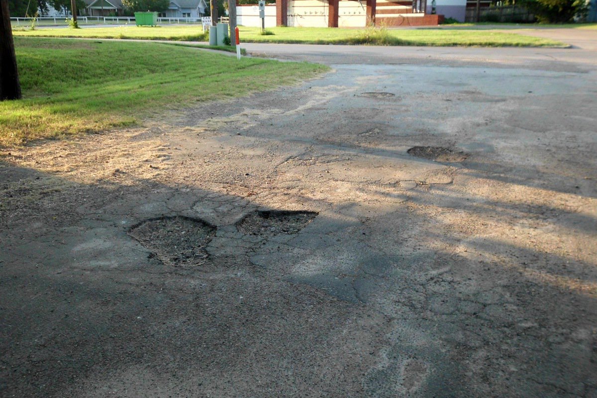 Image: Cannot avoid pot deep pot holes here.