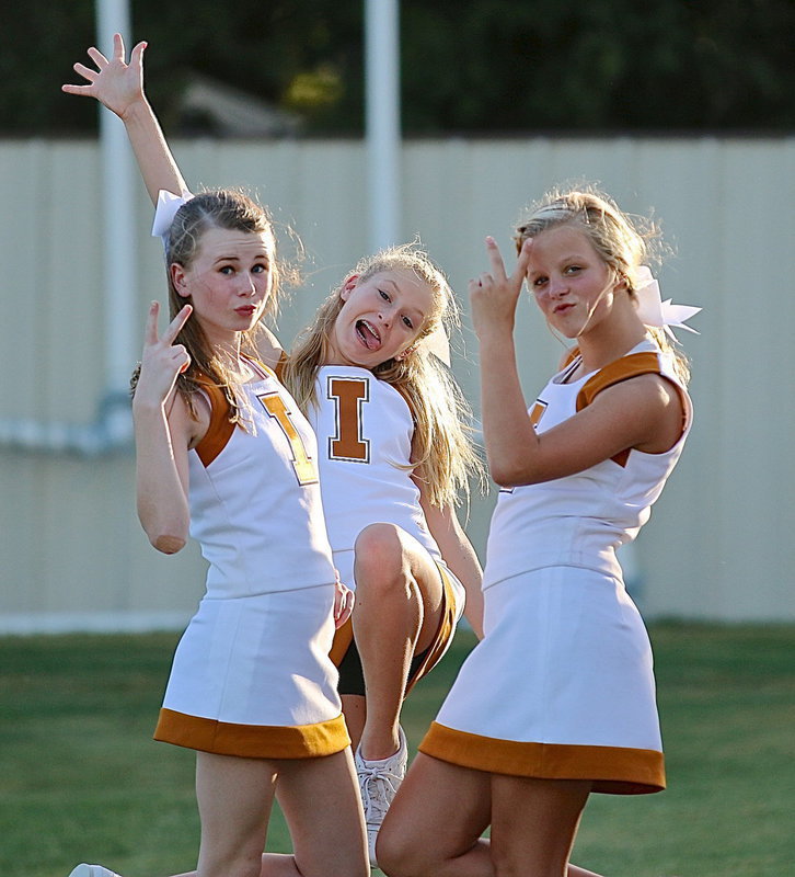 Image: Kimberly Hooker, Courtney Riddle and Alex Jones get their cheer on!