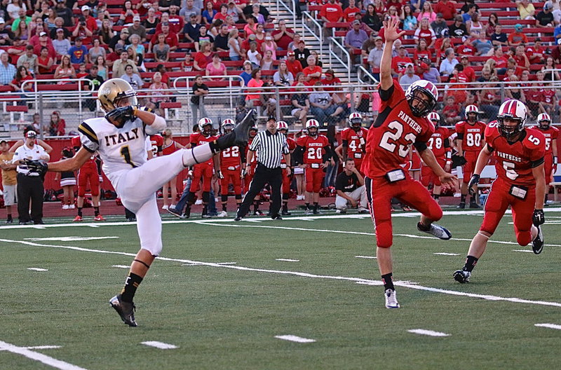 Image: Gladiator punter Levi McBride(1) sends a punt down to the Panther 2-yard line.