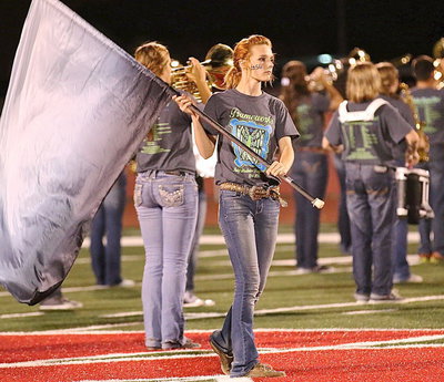 Image: Kayla Cunningham during her halftime flag routine as a member of the Italy High School Flag Corp.