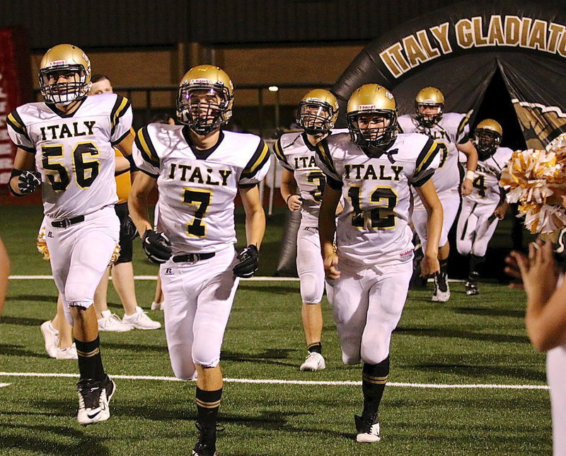 Image: Gladiators David De La Hoya(56), Ryan Connor(7), Hunter Merimon(3), Kyle Tindol(12), John Byers(60) and Kendrick Norwood(4) charge onto the field to begin the second-half.