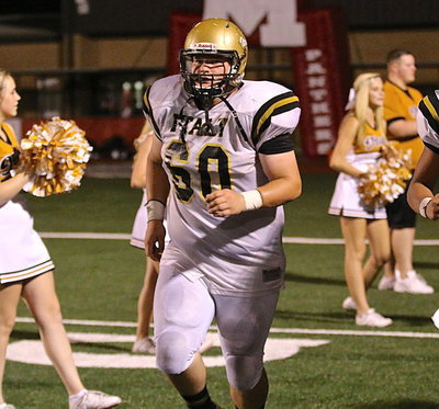 Image: Senior lineman John Byers(60) is on a mission in the second-half.