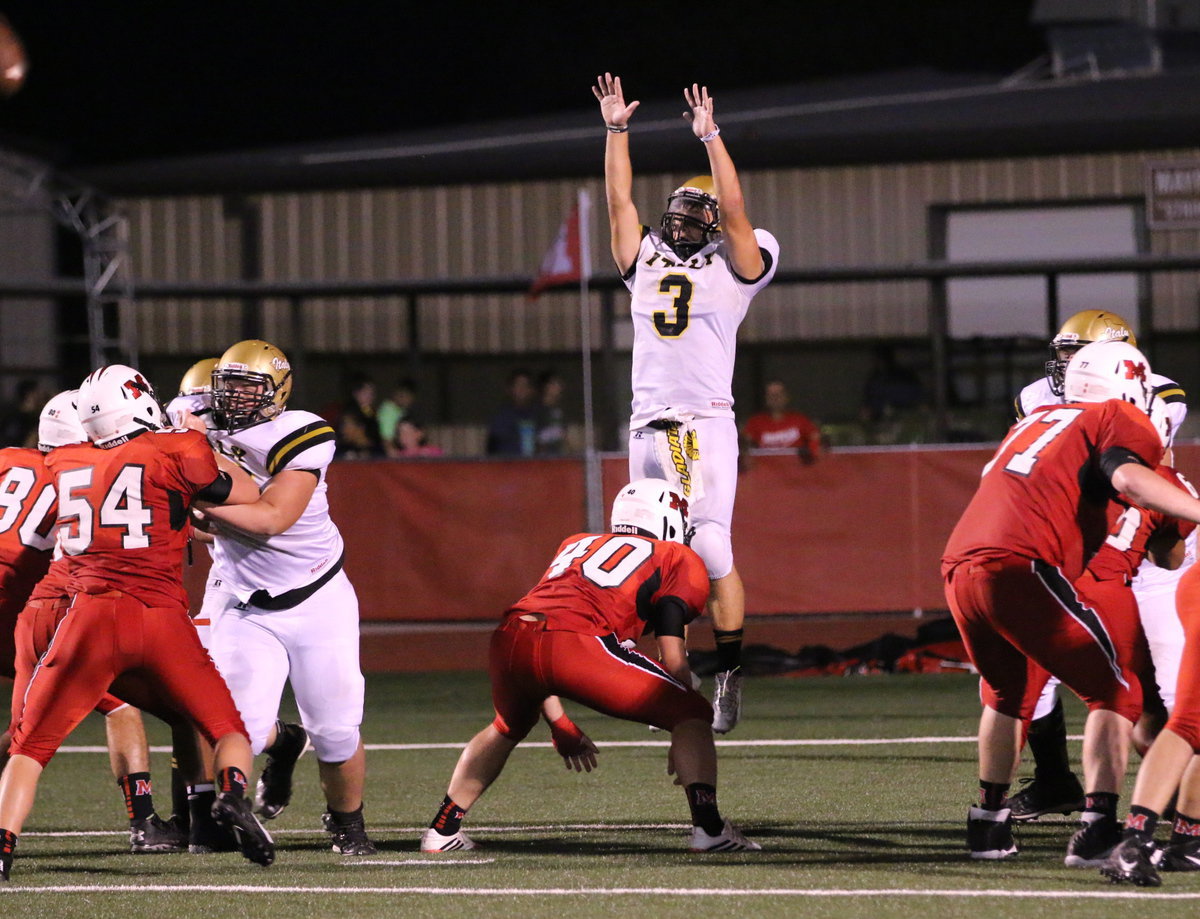 Image: Italy’s Hunter Merimon(3) rises in hopes of blocking a Panther point after kick.