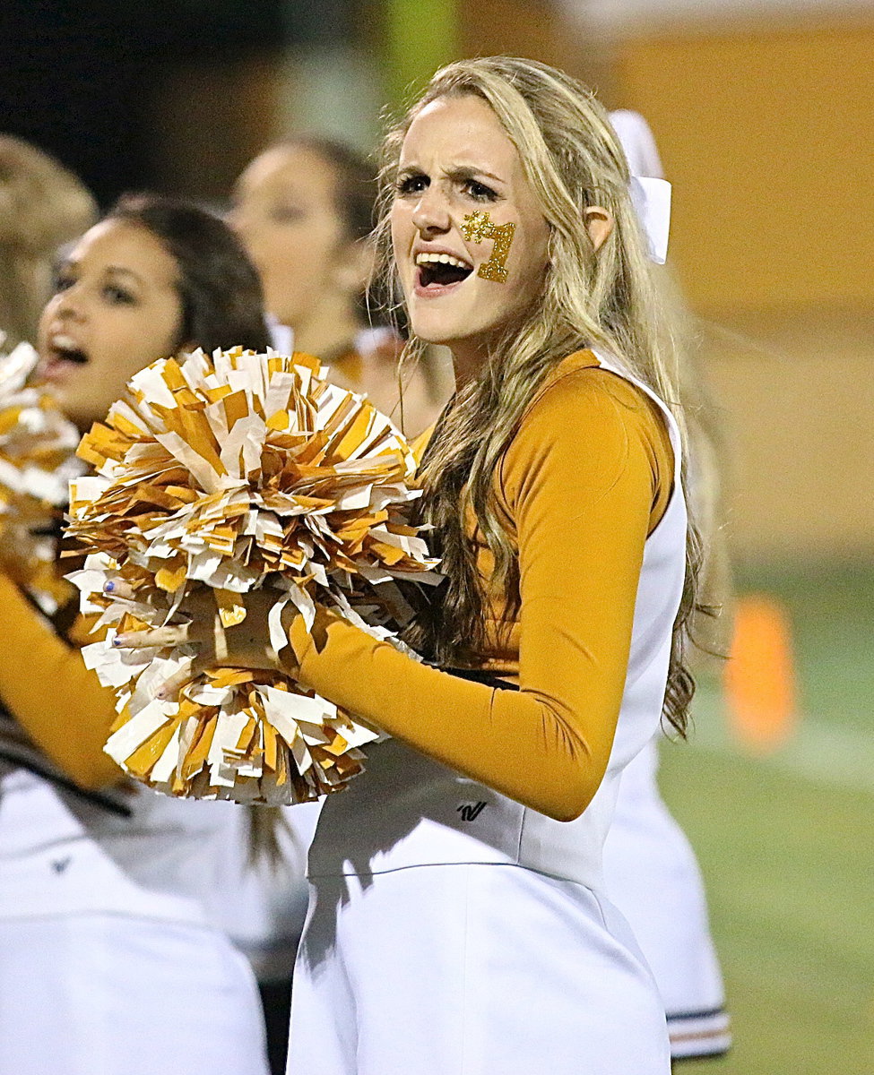 Image: Kirby Nelson is intense as she implores her Gladiator players to keep charging forward.