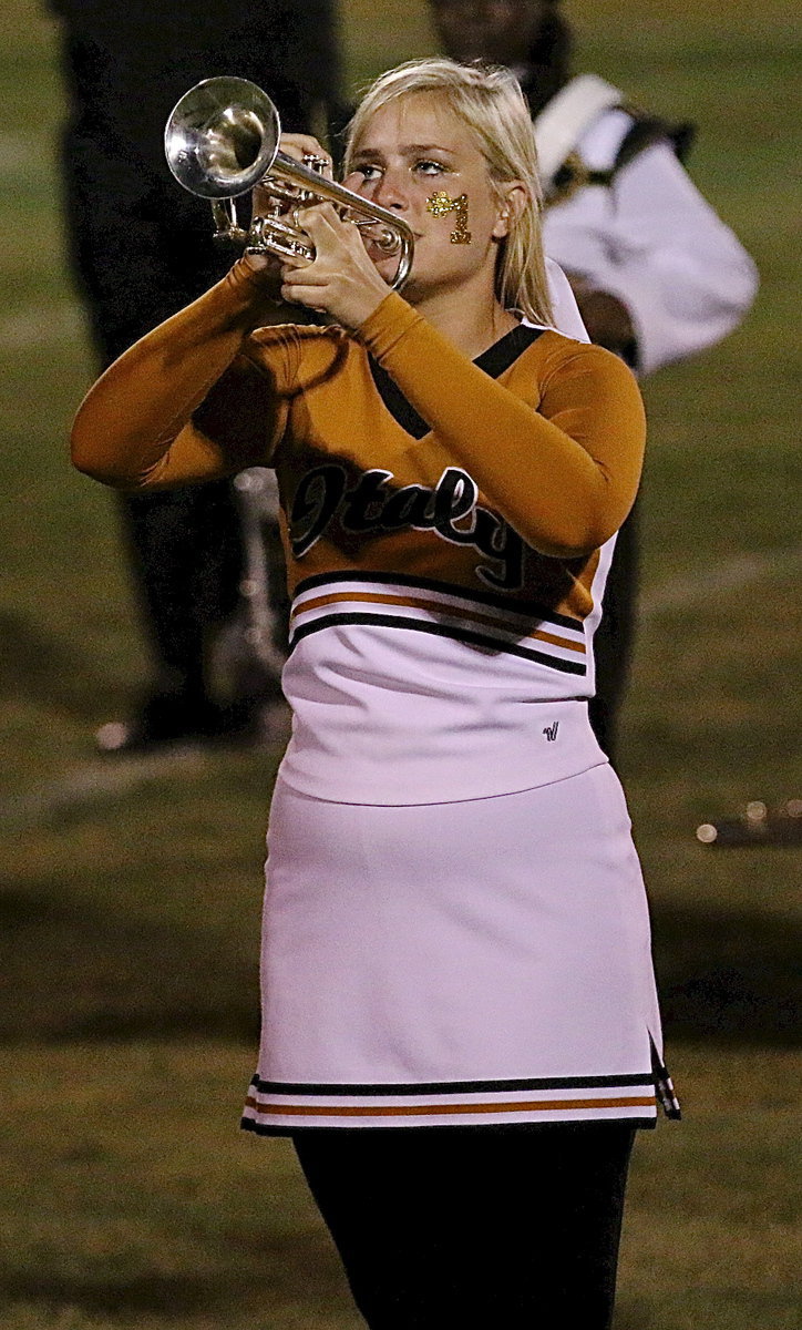 Image: Madison Washington takes a break from cheering.