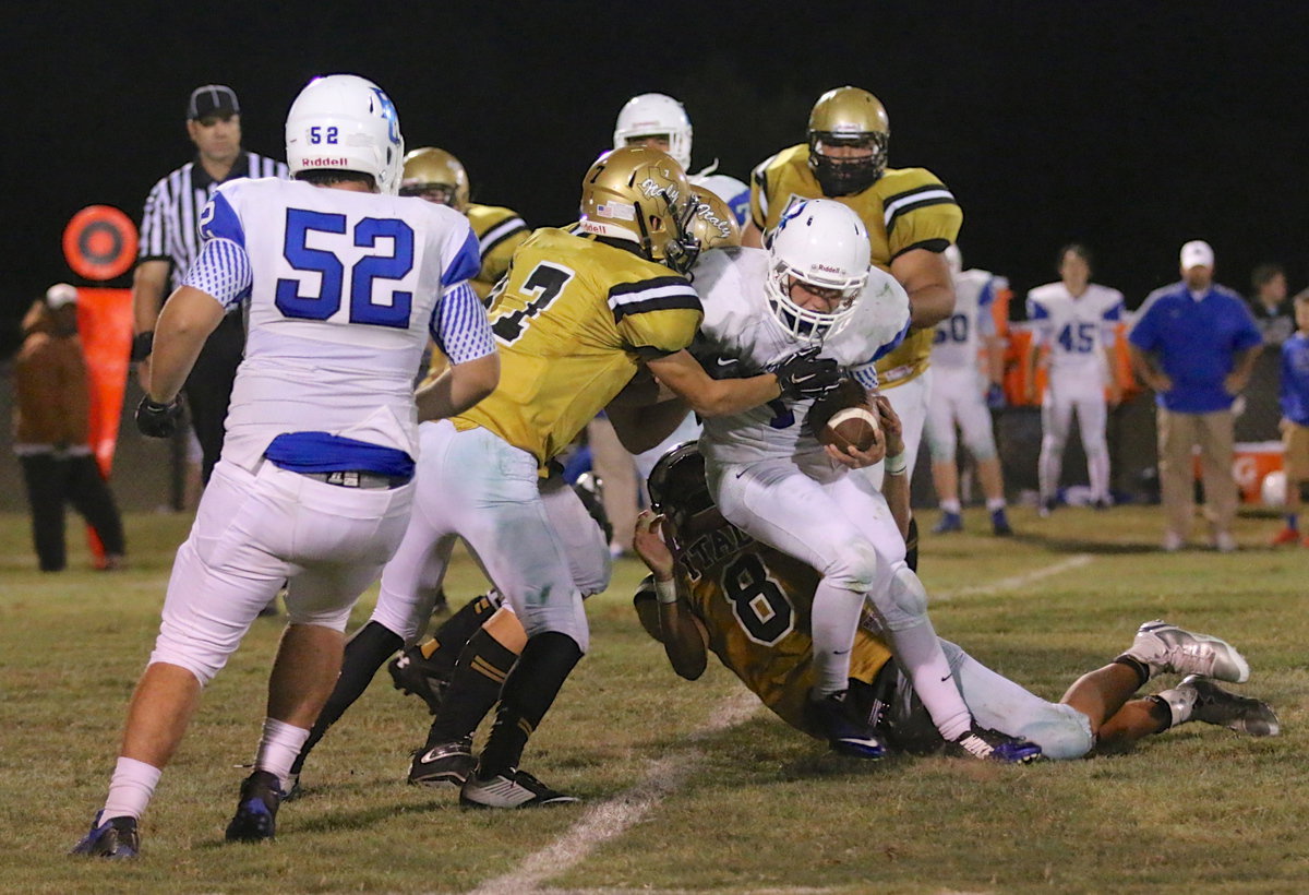 Image: Gladiators Ryan Connor(7) and Joe Celis(8) make a defensive stop.