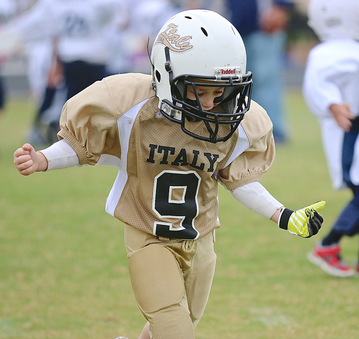 Image: Jayden Hernandez(9) is pumped after he and his C-team Gladiator teammates defeated Rice 20-0 in what was Hernandez’ first football experience sporting the gold and white.