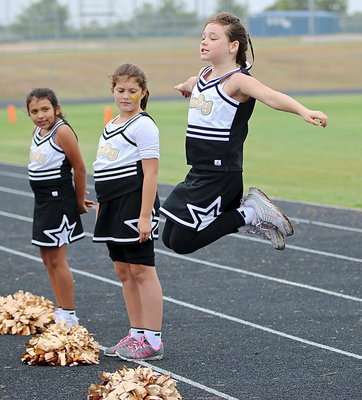 Image: IYAA cheerleaders have gravity-defying spirit!!!