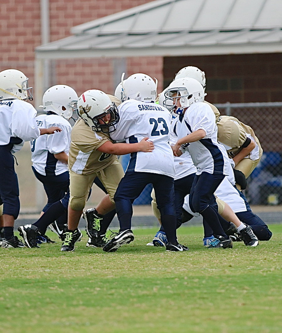 Image: That’s Wyatt Ryan(89) charging into the Bulldog backfield to foil a conversion try by the Bulldogs.