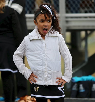 Image: Sicily can’t believe her C-team Gladiators just went up 20-0 against Rice.