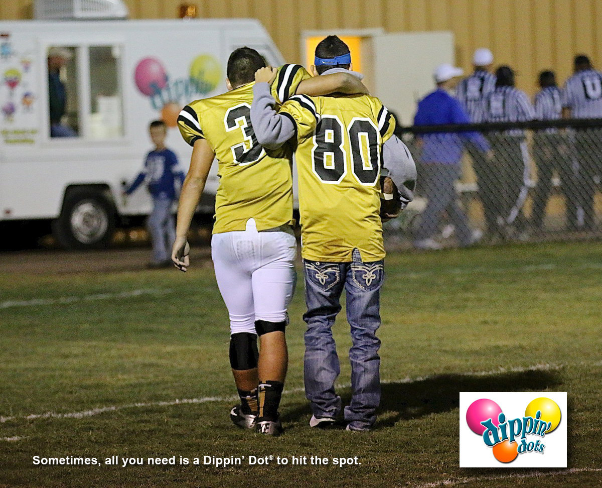 Image: Injured Gladiators Hunter Merimon(3) and Jack Hernandez(80) figure some Dippin’ Dots might just hit the spot.