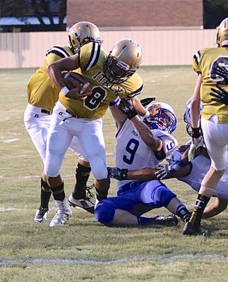 Image: Gladiator QB Joe Celis(8) attempts to manhandle his way into the endzone with Italy desperate to get their first touchdown of the season.