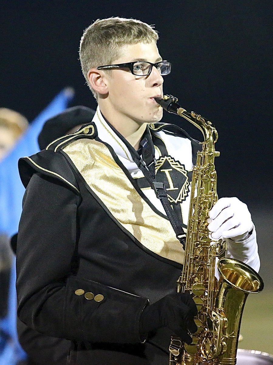 Image: Michael Hughes plays his sax like a pro.