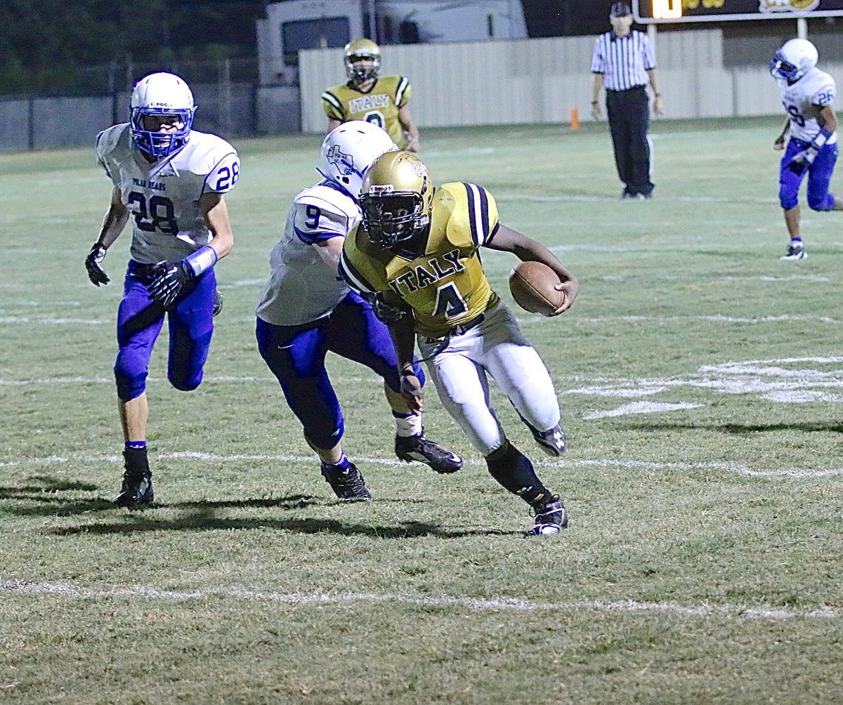 Image: Returning an interception for the Gladiators is freshman linebacker Kendrick Norwood(4) to finish off the Polar Bears.