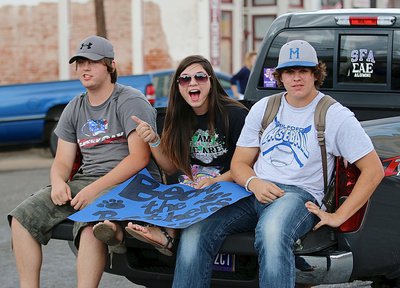 Image: Beat the Panthers!!! Lonnie Mantooth, Emily Garza and Will Price are tailgating during the homecoming parade.