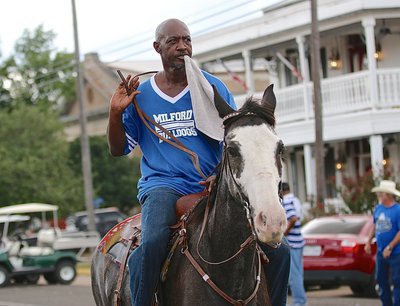 Image: What’s a parade without a horse and rider? Hi-ho Bulldogs!
