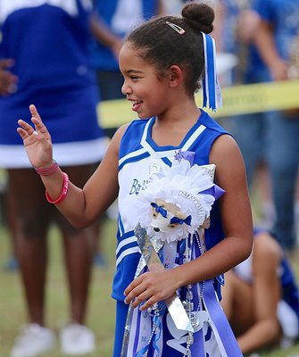 Image: Milford’s pee-wee cheerleader Jamie Jackson is enjoying her homecoming experience.