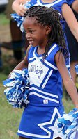 Image: Milford pee-wee cheerleader Brooklyn Washington impresses during the pep rally with her squad’s routine.