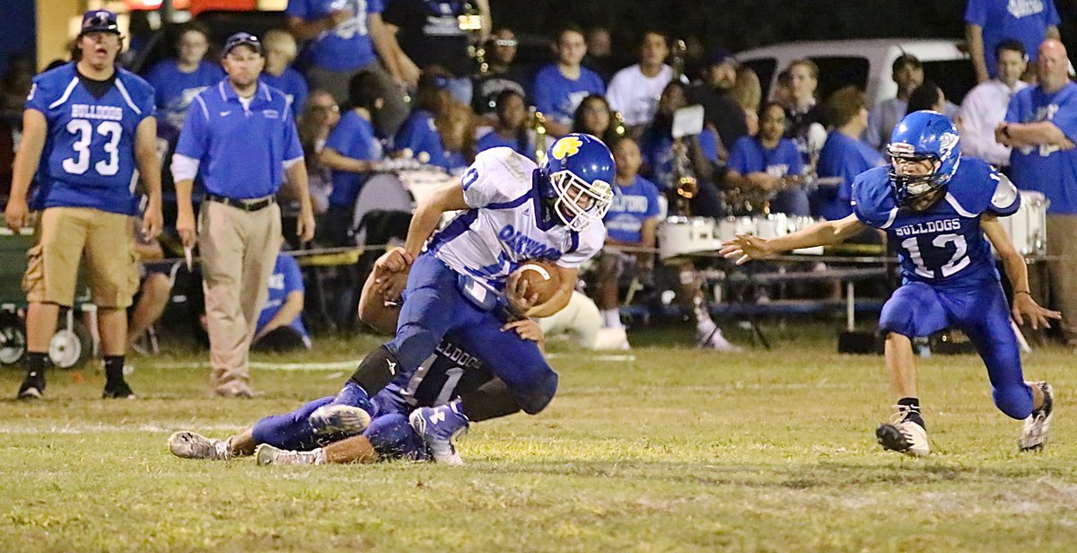 Image: Jaquay Brown(11) latches onto the Oak Wood.