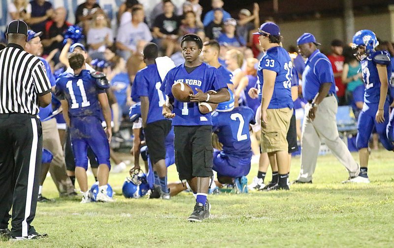 Image: Manager Taron Smith looks forward to his time to shine for the varsity Bulldogs.