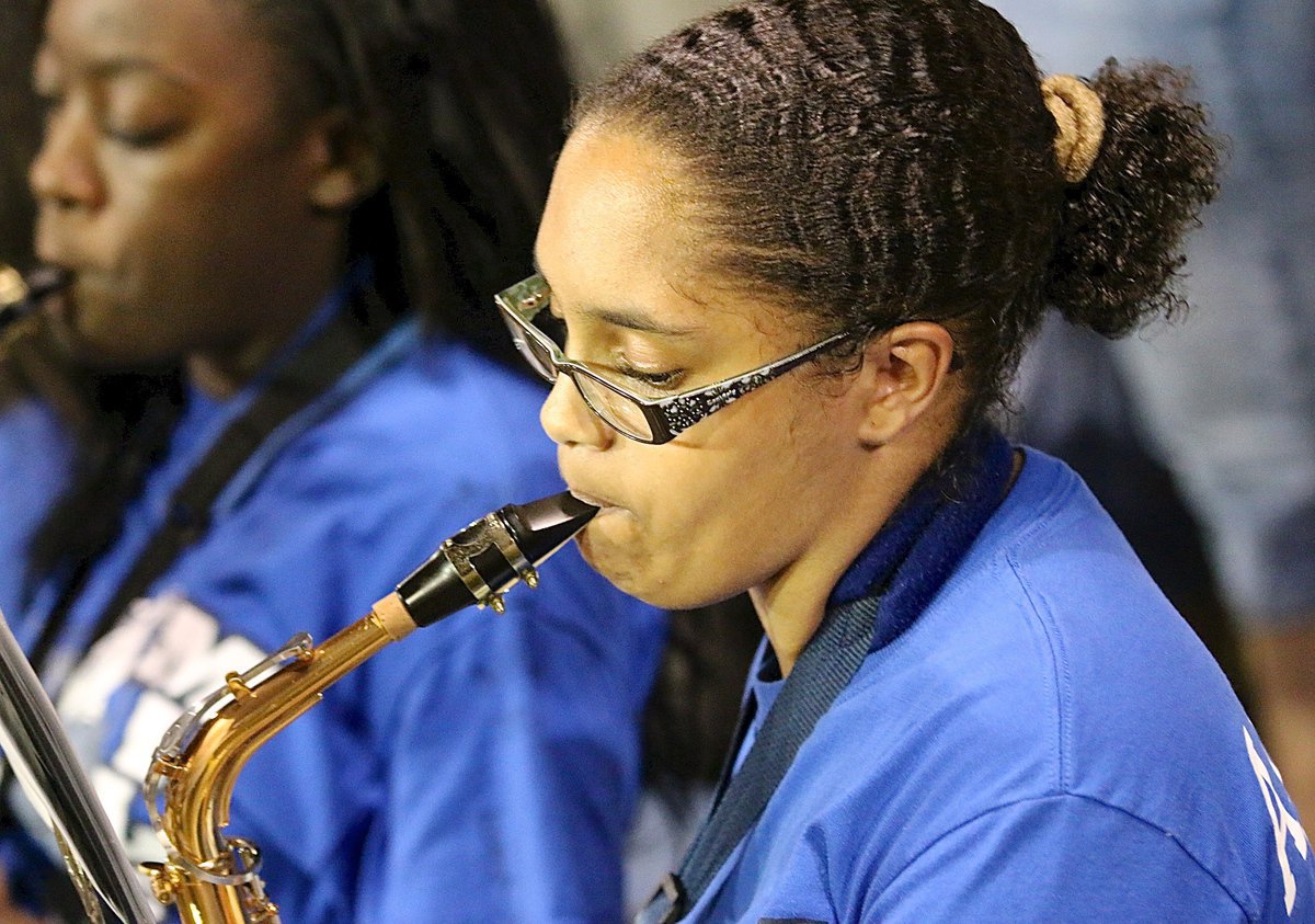 Image: Alexis Jennings encourages her Bulldogs via her sax.