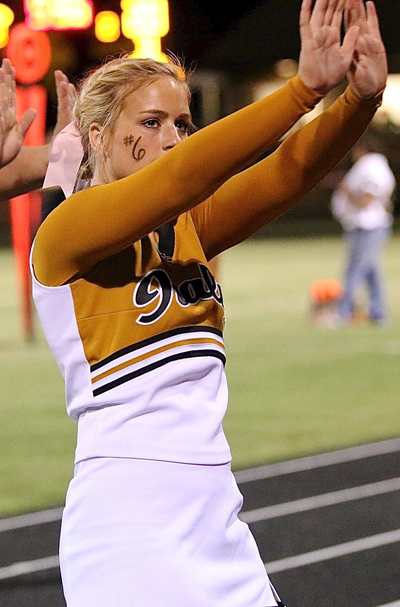 Image: Italy High School cheerleader Madison Washington urges the Gladiators forward…