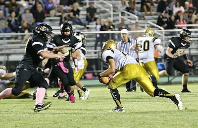 Image: Italy receiver Kyle Tindol(12) snags a pass inside Meridian’s 20-yard line.
