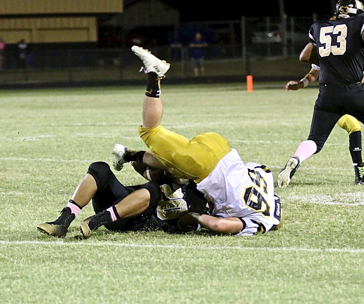 Image: Gladiator senior linebacker Kyle Fortenberry(66) brings down a Meridian running back.