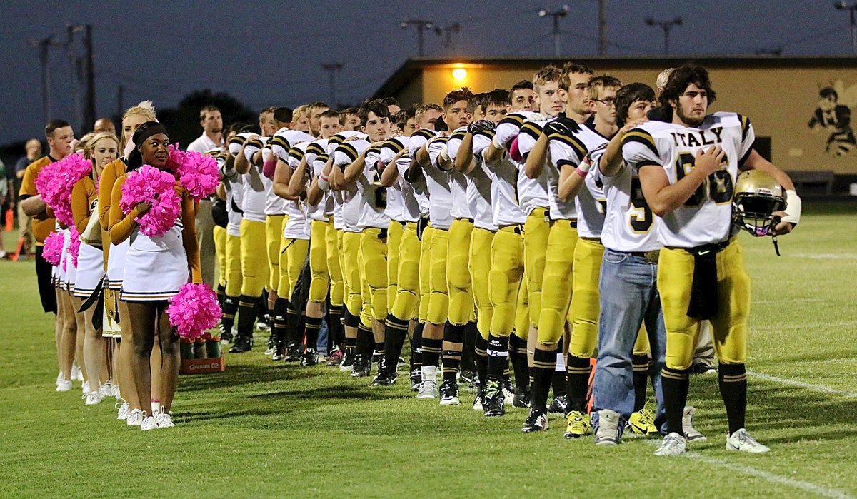 Image: The Gladiators and their cheerleaders prepare for a district battle with Meridian.