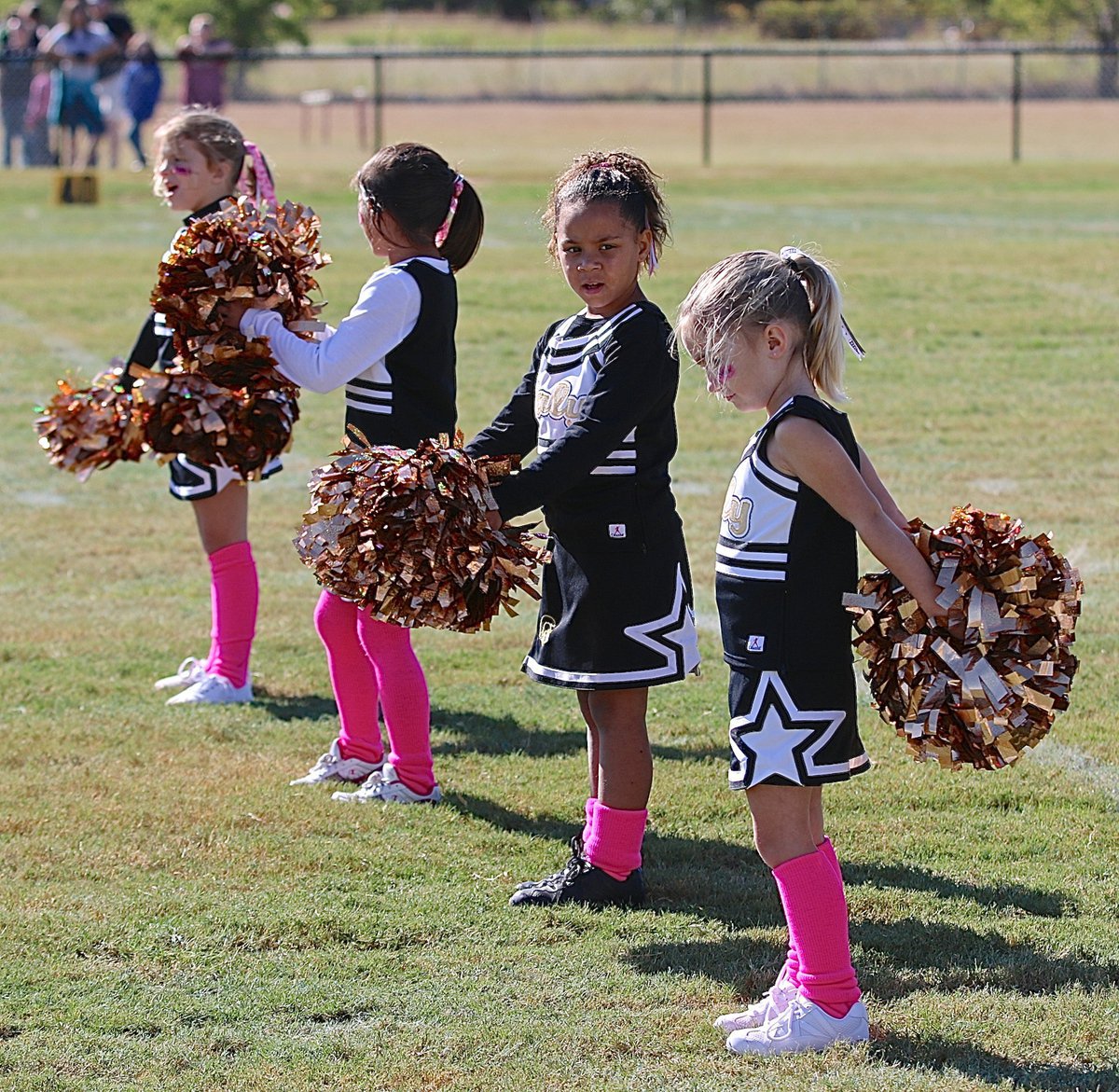 Image: IYAA C-team cheerleaders are proud of their guys after Italy’s 26-13 win over Mildred.