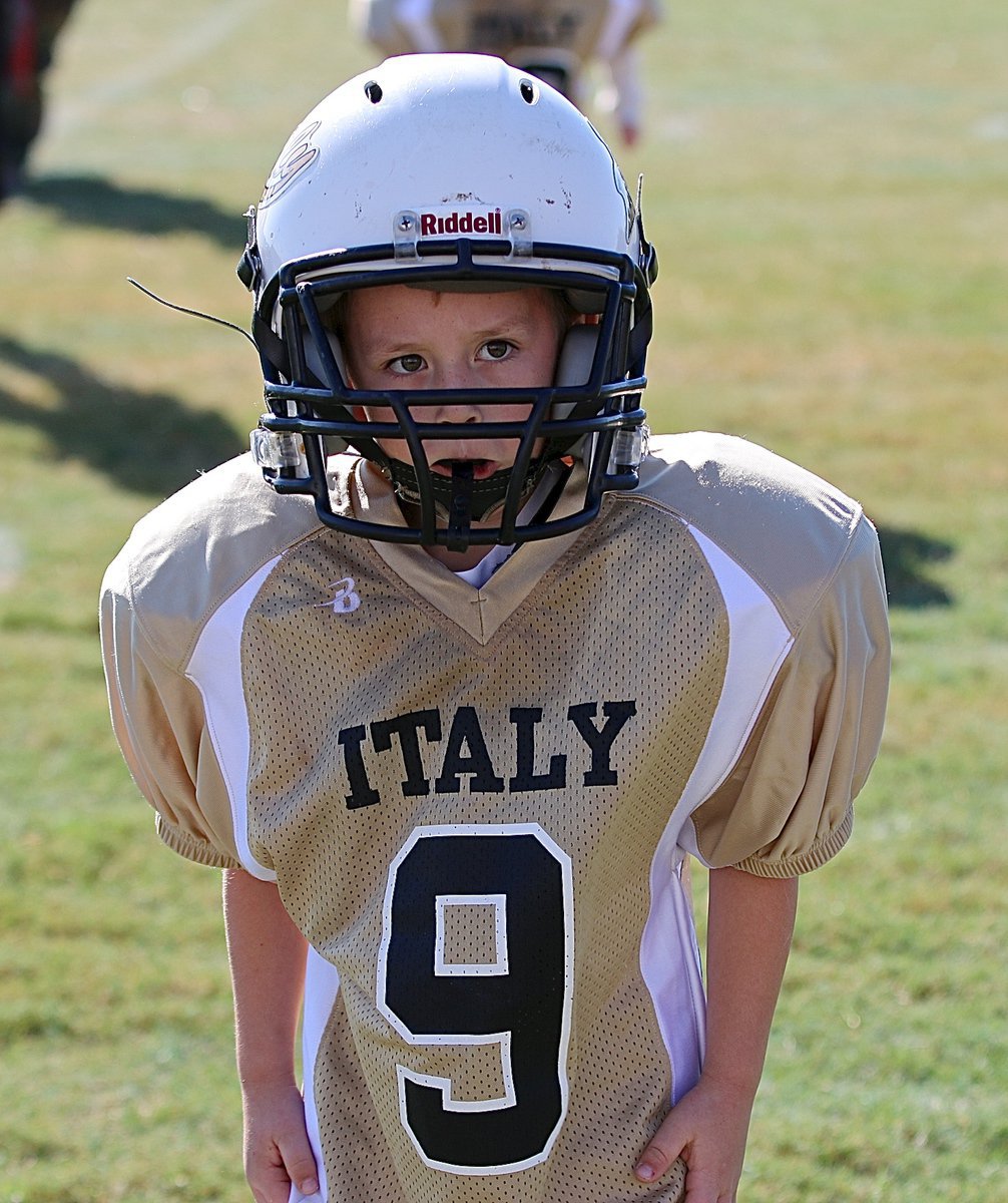 Image: Jayden Hernandez(9) stands victorious after he and his IYAA C-team Gladiators defeated the Mildred Eagles to improve their division record to 2-1.