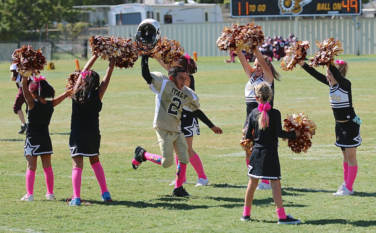 Image: IYAA B-team Gladiator quarterback Jaylon Wallace(2) knows how to celebrate a win!