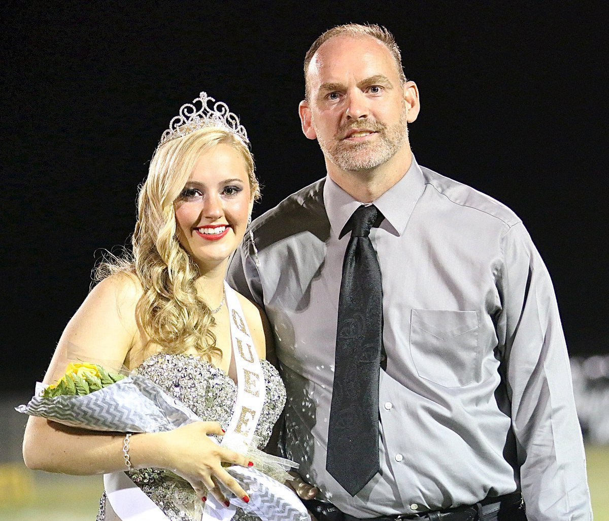 Image: 2014 Homecoming Queen Kelsey Nelson and proud father Doug Nelson.