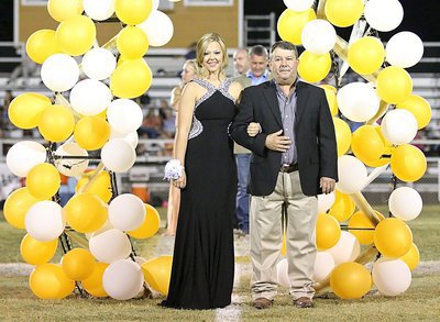 Image: Homecoming Queen Nominee Bailey Eubank, a senior, is escorted by her father, Larry Eubank.