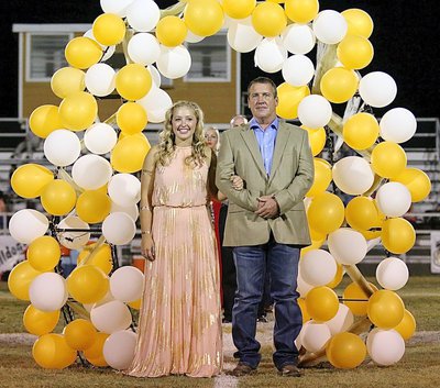 Image: Homecoming Queen Nominee Jaclynn Lewis, a senior, is escorted by her father, Russ Lewis.