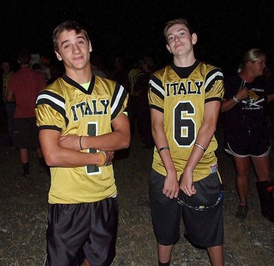 Image: Levi McBride(1) and Clayton Miller(6) are prepped for the homecoming bonfire.