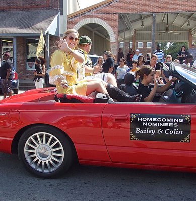 Image: Homecoming Queen Nominee Bailey Eubank and Homecoming King Nominee Colin Newman(76) cruise the parade in style.