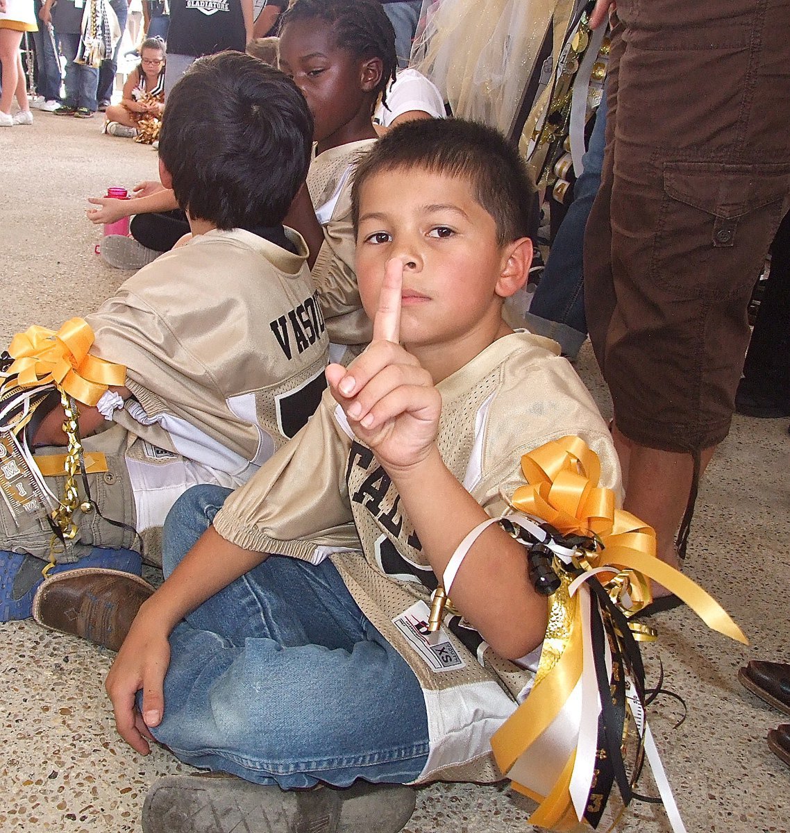 Image: IYAA C-team football player Ramzi Holt(33) has the Gladiator spirit.