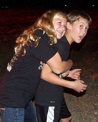 Image: Karson Holley and bro Kort Holley can’t get along at the bonfire either.