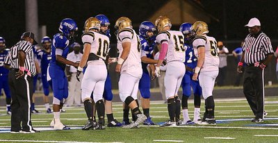 Image: Gladiator captains Coby Jeffords(10), John Byers(60), Cody Boyd(15) and John Escamilla(50) greet the Pirate Captains.