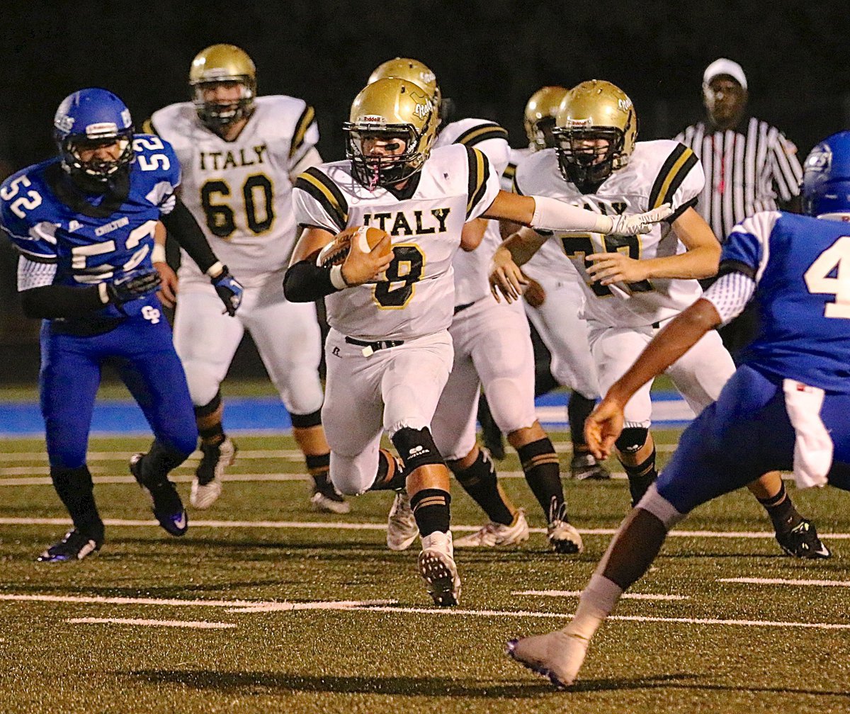 Image: Quarterback Joe Celis(8) finds running room against the speedy Chilton defense.