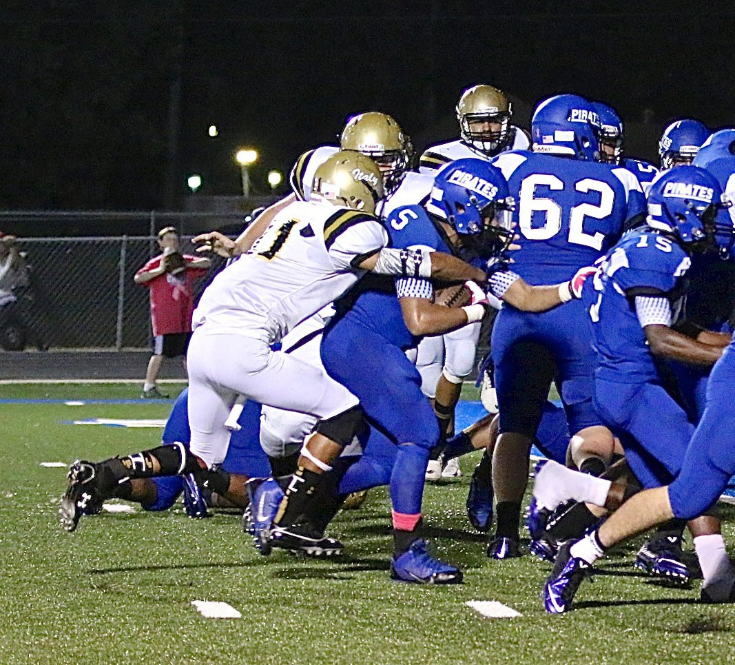 Image: Italy’s Fabian Cortez(11) helps bring down a Chilton ball carrier short of the goal line.