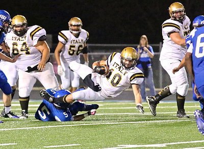 Image: Italy tailback Coby Jeffords(10) finishes the run as he reaches for more yards against Chilton.