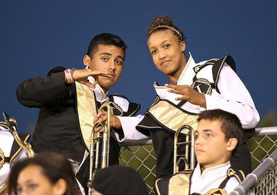 Image: Band mates Jorge and Emmy show their spirit from all the way up in the cheap seats.