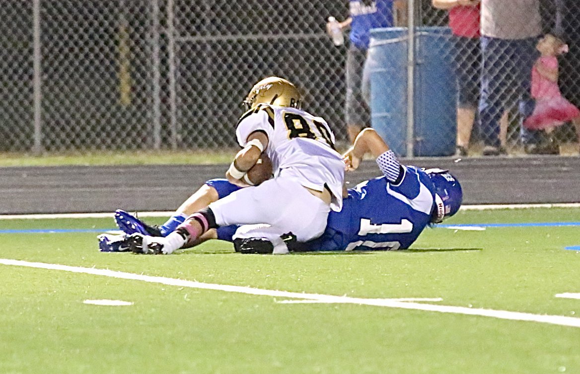 Image: Senior safety Jack Hernandez(80) comes down with an interception for the Gladiators.