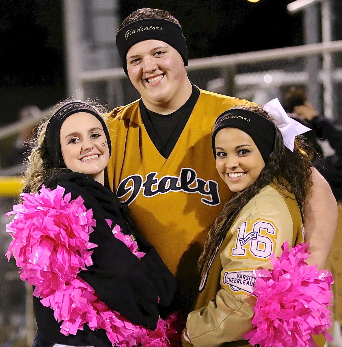 Image: Italy cheerleaders Kirby Nelson, Zac Mercer and Ashlyn Jacinto have faith in their Gladiators.