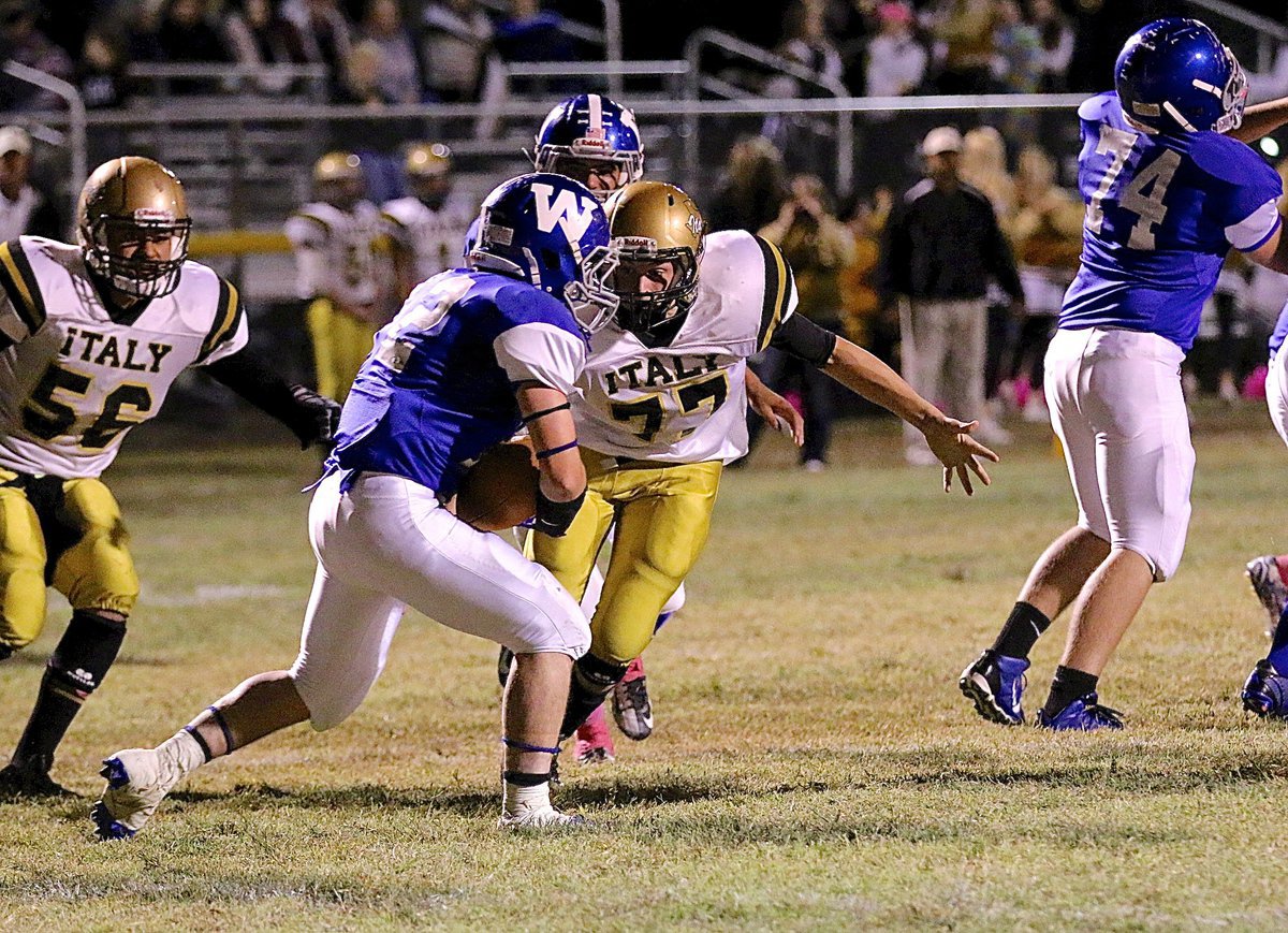 Image: Clay Riddle(77) strikes again with a tackle in Wortham’s backfield.